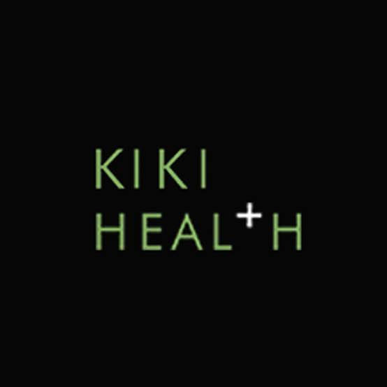 KIKI Health wellness products on a stand among green leaves